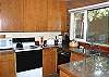 This kitchen has updated beautiful counter tops.