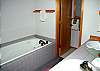 Tub and separate toilet.