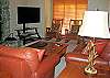 Wood burning fireplace will warm you on those cool evenings in this comfortable living room.