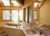Very large Master Suite Bathroom.  Enjoy soaking in this wonderful jacuzzi tub.  There is also a very large walk-in shower.