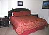 Private master king bedroom downstairs, TV, DVD/VHS and bath has tub/shower and door to the outside.