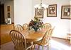 Great view of the dining room table. Light and bright.