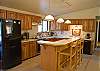 The kitchen and dining room connect to make coordinating meals a breeze.