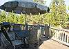 Get comfortable and cook dinner on the BBQ on this upper deck with view of golf course off the upstairs living area.