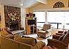 Living Room with wood burning fireplace.