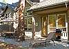 Back patio with gas BBQ and comfortable patio furnishings.