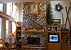 High ceilings, wood and rock accents make this a very special vacation home.