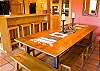 Dining Table. There is plenty of room for the entire family to gather around this old country style table. A convenient breakfast bar as well.