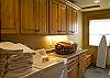 Sunriver House rental - Interior Photo - Laundry Room with Door to Hot Tub