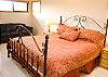 Comfortable upstairs master bedroom.