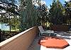 Hot tub off of master King suite and view of lake.