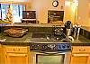Granite counter tops and updated stainless steel appliances will make cooking a treat! Kitchen opens up into living room and dining room.