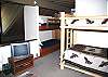 The loft has two sets of Bunks and a Full Size Bed. Room for all the crew.