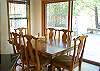 Bright and sunny dining area off of kitchen for breakfast or a 1000 piece jigsaw puzzle!