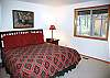 King master bedrooom. Has a door to the deck and hot tube.