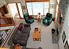 This home has a great open floor plan. Kitchen and dining are open to this warm living area. Kick up you heels and relax after a long day of fun in Sunriver.