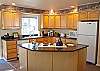 Kitchen open to all that is going on.