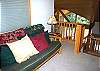 This is a cozy Loft with a Fouton Couch, TV/VHS.