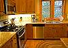 Another view of the kitchen Lots of natural light.