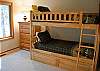 Bunk beds are perfect for the kiddies along with a great flat screen TV.  Also there is a Trundle for a 3rd Twin in this room!
