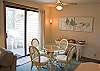 Enjoy your meals at this cozy table and wander out onto the deck for an enjoyable relaxing time.