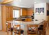 Kitchen bar is a perfect place to enjoy a cup of coffee.