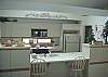 This kitchen is fully equipped and organized for easy preparation of family meals, and the open floor plan makes it so the chef never feels 