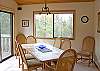 Dining Area. Great windows in this home.  Enjoy the view while you dine. Upper deck right off of this dining area.