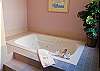 Upstairs Master King Bathroom.  Time to relax in this enormous and private jacuzzi tub.