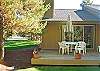 The back deck has seating for four and is a great spot to relax and enjoy Sunriver.