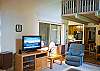 Nice open floor plan with flat screen TV.