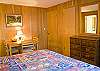 King Bedroom with table and chairs for a quite card game or puzzle.