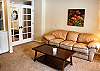 Den/Family Room with comfortable sleeper sofa and a TV.
