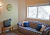 Hide-A-Bed in loft with TV.