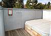 The hot tub is on the lower deck and has a great sense of privacy.