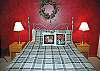 Sweet dreams in this downstairs Queen Bedroom.