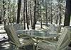 Wait for the wildlife to come to you while you enjoy a steaming cup of coffee on this cozy patio!