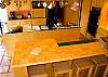 Large, spacious kitchen with a breakfast bar that seats 4.