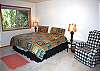 King Master Bedroom upstairs.  This room offers a small TV/VHS and stereo.  Master Bath has shower.