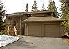 Front entrance of home with a 2 car garage.