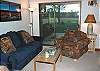 Sliding door opens on to back deck.