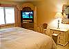 Flat Screen TV with a DVD in the Master Bedroom Downstairs