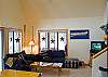 Living Room with lots windows to bring the outdoors into the home.
