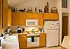 This great kitchen is equipped with many amenities, and since the kitchen is open to the living and dining room the family chef will never be left out of the action.