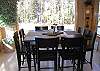 Enjoy this beautiful view from the dining room table. Great place for a  delicious meal and great conversation.  Additional seating at breakfast bar.