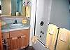 Downstairs Bathroom.  There is one bathroom in each queen bedroom plus a hall bathroom.