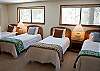 This room upstairs has 4 Twin Beds and uses the hall bathroom.