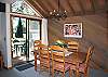 Enjoy a meal in or out in this cheerful dining room.