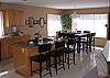 Lots of space for meal preperation, and dining. Extra seating at the breakfast bar.