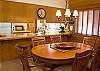 Enjoy your meal with this serve through breakfast bar.  Also, seating for 4 more at the breakfast bar.